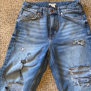 light washed ripped denim boy friend jeans